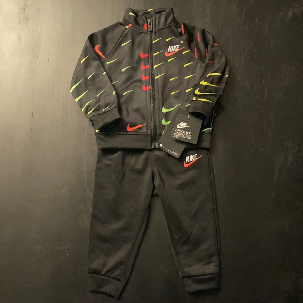 Nike tracksuit size 9M